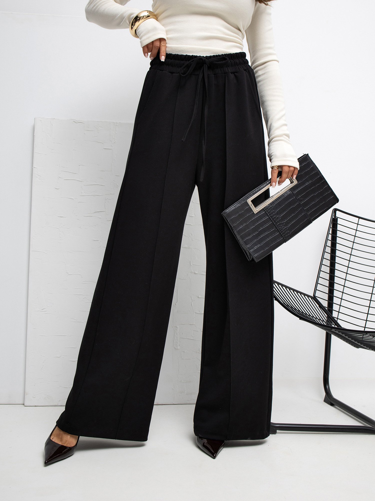 Pantalón palazzo de punto con bolsillos Miley – negro